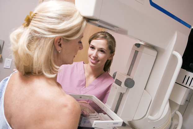 Nurse Assisting Patient with Breast Health Mammogram